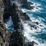 Turquoise Ocean Waves Crashing Against Sea Cliffs — Drone View — AI generated preview